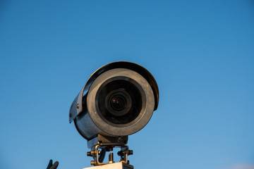 CCTV security camera with blue sky background