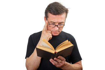 Portrait of a Mature man with glasses and a book