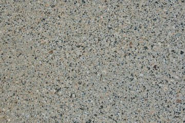 Fragment of stone floor. Texture of granite chips. Abstract granite wall pattern. 