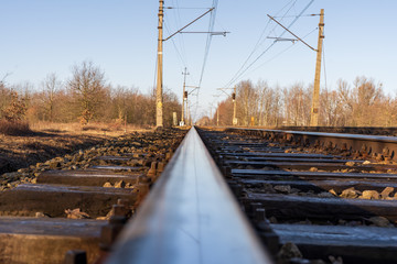 Fototapeta na wymiar Railway with semaphore and electric poles.