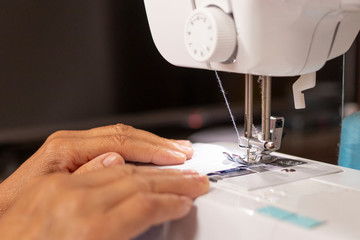 Sewing machine worked by a seamstress