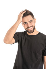 Handsome man with healthy hair on white background