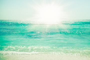 beautiful ocean with shoreline, sand and sunlight
