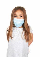 Portrait of a baby girl wearing medical mask on white background