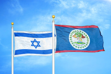 Israel and Belize two flags on flagpoles and blue cloudy sky