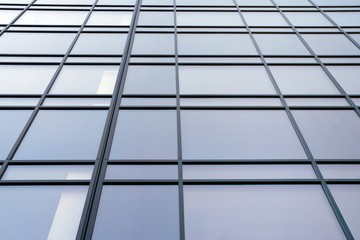 Abstract texture and blue glass facade in modern office building.  