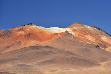 Fototapeta na wymiar Colored mountains in Bolivia. Panorama of the Atacama Desert.