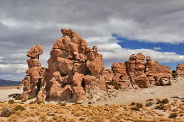 Fototapeta na wymiar Red stone cliffs in the desert of Latin America.