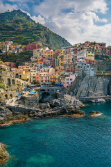 Italian coastline and colorful Manarola town in Cinque terre, Italy.