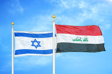 Israel and Iraq two flags on flagpoles and blue cloudy sky