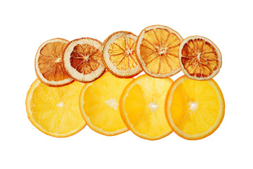 translucent orange slices on a white background, dry and ripe slices together