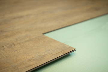 Vinyl laminate. Laying of the floor covering.