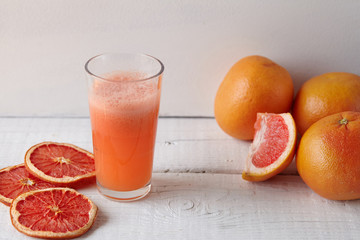 grapefruit juice on the light background