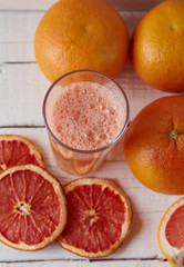 grapefruit juice on the light background