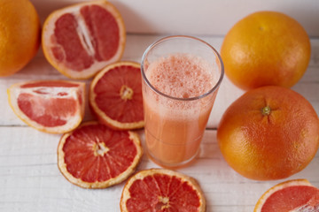 grapefruit juice on the light background