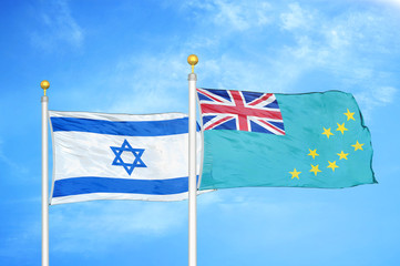 Israel and Tuvalu two flags on flagpoles and blue cloudy sky