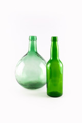 Vintage empty demijohn and green bottle