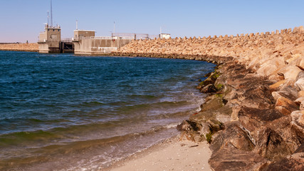 Hurrricane protection barrier extending from Fort Phoenix shoreline
