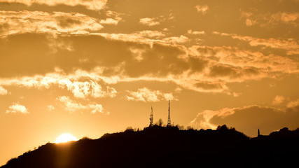 Antennas silhouette at the sun set
