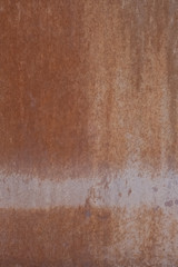 Metal rust background. The surface is painted rust. Rusted metal wall. Grunge rusty metal texture 