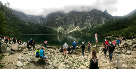 Zakopane, Poland, September 8, 2019: Sea eye is the largest and fourth deepest lake in the Tatra Mountains. Panoramic photo.