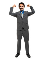 Successful business man with arms raided- isolated over a white background