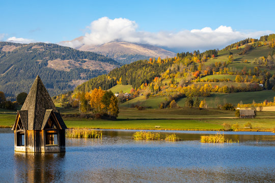 autumn pond under the mountains, Murau district,.Styria, Austria