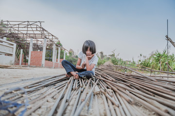 Children are forced to work in the construction area. Human rights concepts stop child abuse,...