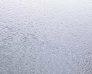 Abstract pattern. Drops of moisture on the background. Condensate. Focus at the top of the picture