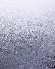 Abstract water drops glass close up background