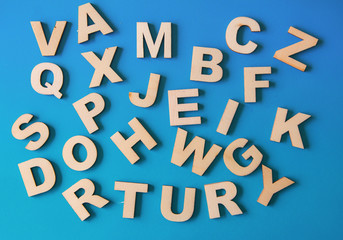 Background Of White Wooden Letters On A Blue Cardboard
