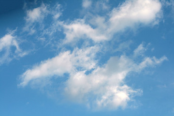 Naklejka na ściany i meble clouds in the blue sky during the daytime
