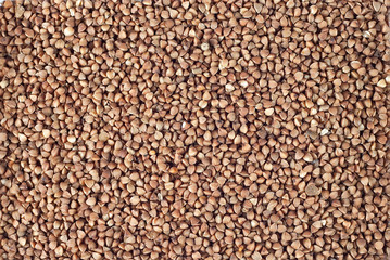 Texture of buckwheat. Many buckwheat on a pile closeup.