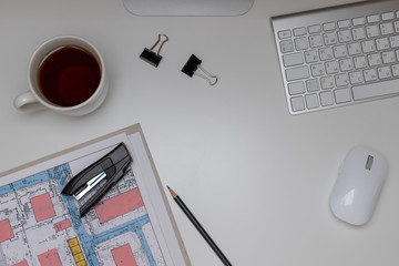 office desk with documents, mouse, keyboard and a cup of hot drink. Working desk table concept. top view, copy space.