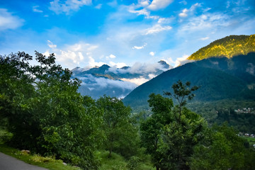 Naklejka premium landscape with mountains and clouds