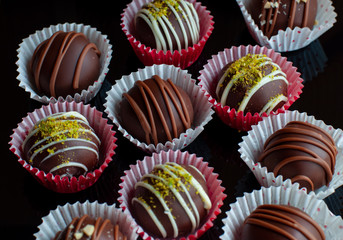 Chocolate ball candies in paper cups