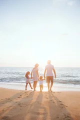  Holiday travel concept, Summer vacations. Happy family are having fun on a tropical beach in sunset. © Ilya Mihailov