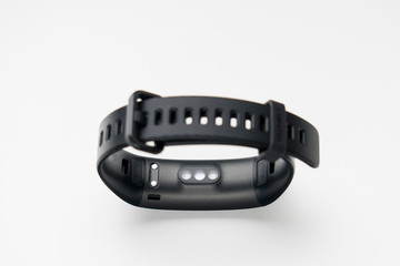 fitness tracker on a white background, selective focus, tinted image.