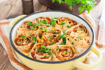 Cabbage pie in a round pan, selective focus