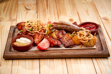 meat appetizer on the wooden tray