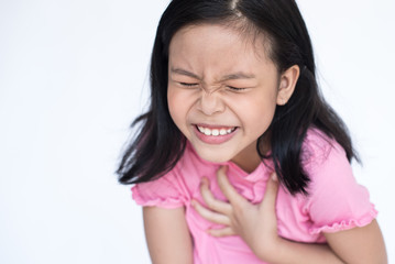 asia little girl feeling unwell and sore throat. as symptom for cold or bronchitis, virus, Coronavirus, (2019-nCoV). healthcare concept. little sick girl sore throat isolated on white background.