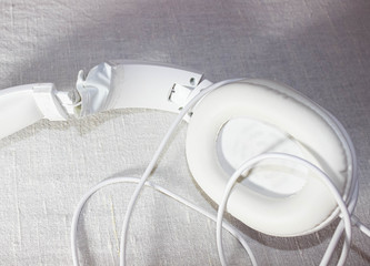 Old broken headphones rewound with duct tape.