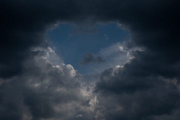 Storm clouds time lapse. Sky clouds forming a symbol of love (heart).