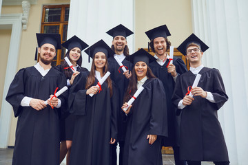 A group of graduates smiling