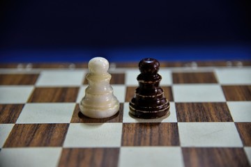 Photography of Chessboard with black and white figure