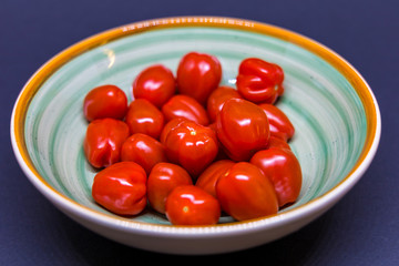 tasty tomatoes in a bowl