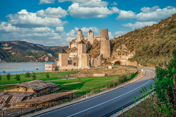 Fototapeta na wymiar View of newly restored former Ottoman stronghold Golubac castle with square and rectangular towers along the Danube river in Serbia on the border with Romania