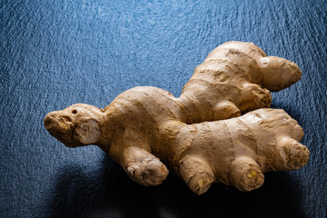 Ginger on black stone background