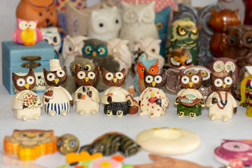 Fototapeta na wymiar Owl Collection , different pieces with different shapes, materials and colors.