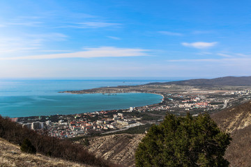 view of the Bay of the resort city of Gelendzhik from the top of the mountains. Black sea coast. Spring 2020